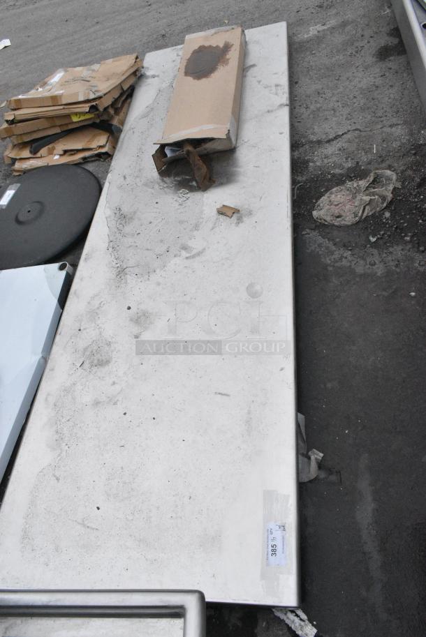 BRAND NEW SCRATCH AND DENT! Stainless STeel Tabletop and Box of Metal Legs - Image 1 of 3