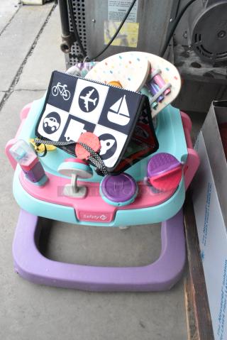 3 Various Items Including Wooden Xylophone Toy, Black and White Childrens Toy and Safety 1st Sit and Play. 3 Times Your Bid!