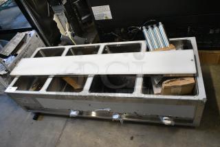 BRAND NEW SCRATCH AND DENT! 2024 ServIt 423EST4WS500 EST-4WS Four Pan Sealed Well Electric Steam Table with Adjustable Undershelf. 120 Volts, 1 Phase. Tested and Working!