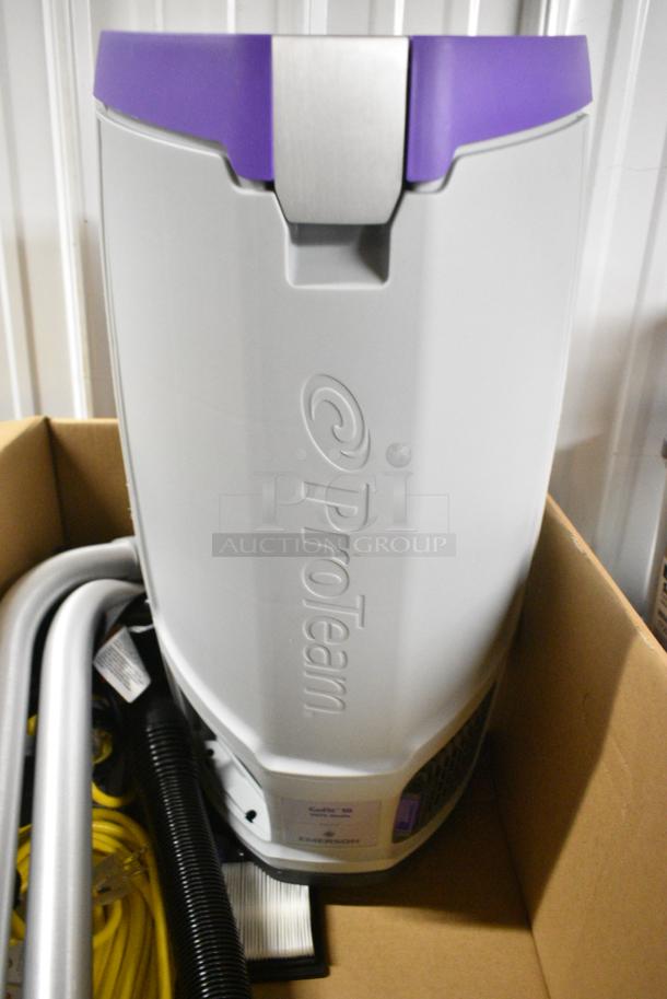 BRAND NEW SCRATCH AND DENT! ProTeam GoFit 10 107751 10 Qt. Backpack Vacuum with 101338 2-Piece Wand and 107016 Xover Multi-Surface Tool. 120 Volts, 1 Phase. - Image 1 of 6