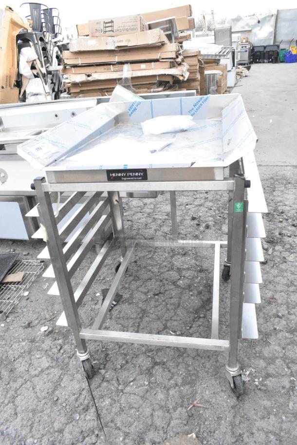 BRAND NEW! Henny Penny Stainless Steel Commercial Portable Breading Table on Commercial Casters. - Image 1 of 7
