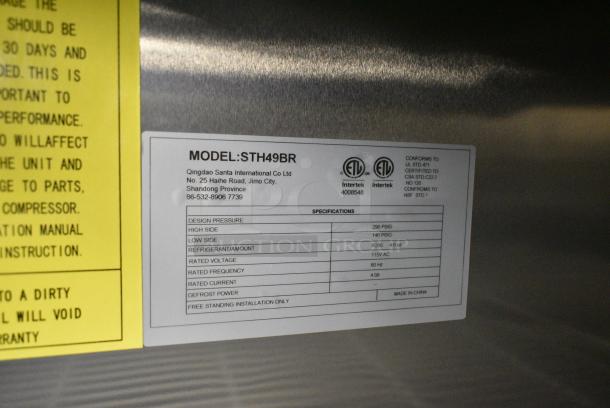 BRAND NEW! Javar STH49BR Stainless Steel Commercial 2 Door Reach In Cooler w/ Poly Coated Racks on Commercial Casters. 115 Volts, 1 Phase. Serial ST2300201ST54R22A001. Tested and Working! - Image 7 of 8