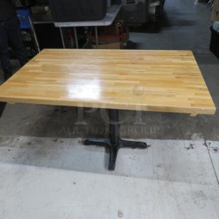 One Solid Wood Butcher Block Table Top On A Pedestal Base. 48X30X30