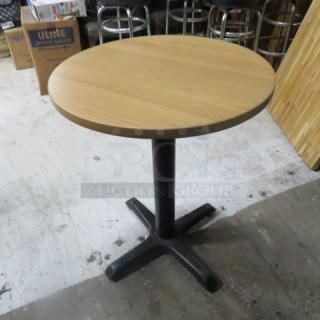 One Round Solid Wood Table Top On A Bar Height Pedestal Base. 24X42