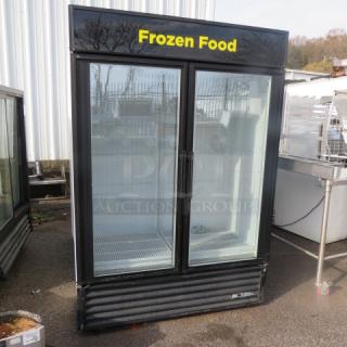 One TRUE  2 Door Glass Display Freezer With 8 Racks. Model# GDM-49F. Unable To Test. 115/208-230 Volt. 54X30X78