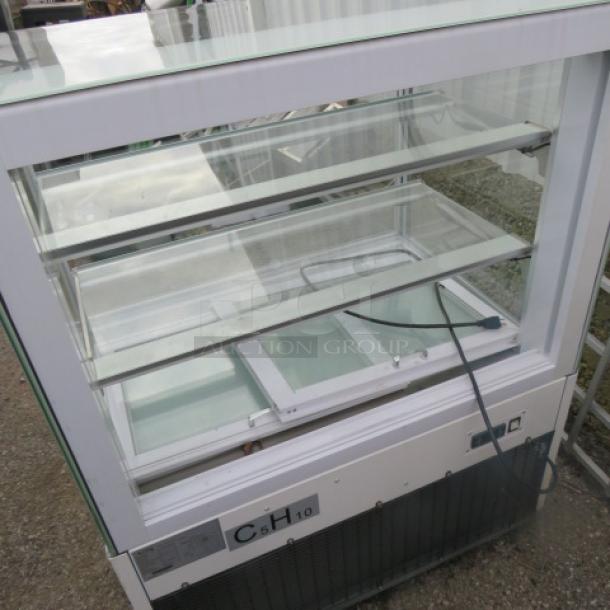 One Avantco Curved Glass Dry Bakery Display Case. Model# 193BCD36W. 110-120 Volt. $1499.00. - Image 2 of 2