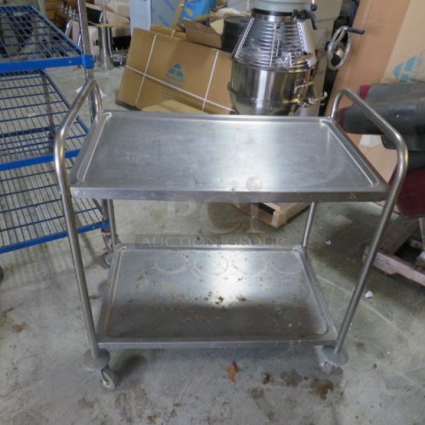 One Stainless Steel 2 Shelf Cart On Casters. 33X21X37 - Image 1 of 1