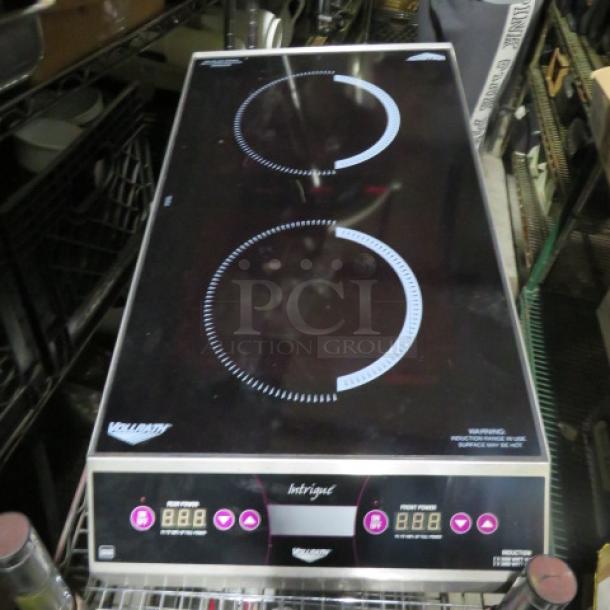 One Vollrath Professional Series Countertop Induction Dual Cooktop. #69522. 208/240 Volt. 1 Phase. Unable To Test. 16X30X5. $3525.30 - Image 1 of 2