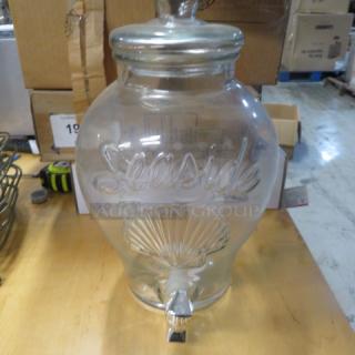 One Decorative Glass Beverage Dispenser.