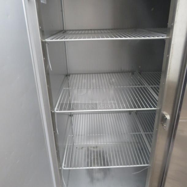 One WORKING  Traulsen 3 Door Refrigerator With 9 Racks On Casters. Model# G30011. 115 Volt. 76X32X84. $8510.36 - Image 3 of 4