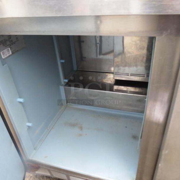 One Delfield 2 Door Refrigerated Prep Table On Casters. Model# 4448N-8. 115 Volt. 48X32X43. $4468.00 - Image 2 of 2