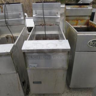 One Pitco Natural Gas Floor Fryer. 16X35X46