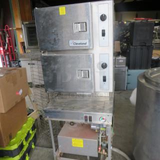 One Cleveland Convection Dual Steamer On A Stand. Model# 24CEM48. 23.5X33.5X63.5. Unable To Test, Missing bottom side panels. $36,364.00.