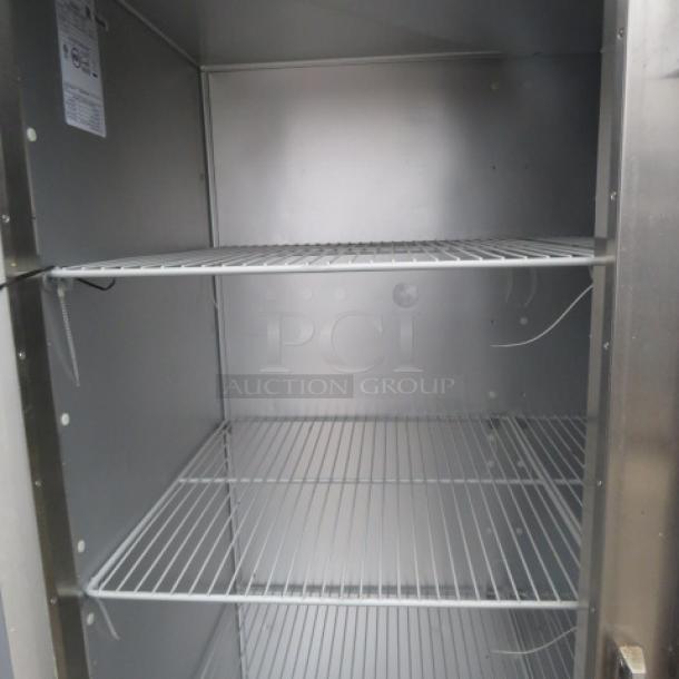One WORKING Traulsen 3 Door Refrigerator With 9 Racks, On Casters. Model# G30011. 115 Volt. 76X32X84. $8510.36. - Image 3 of 4