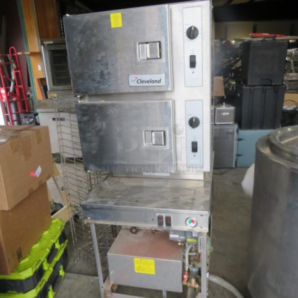 One Cleveland Convection Dual Steamer On A Stand. Model# 24CEM48. 23.5X33.5X63.5. Unable To Test, Missing bottom side panels. $36,364.00. - Image 2 of 2