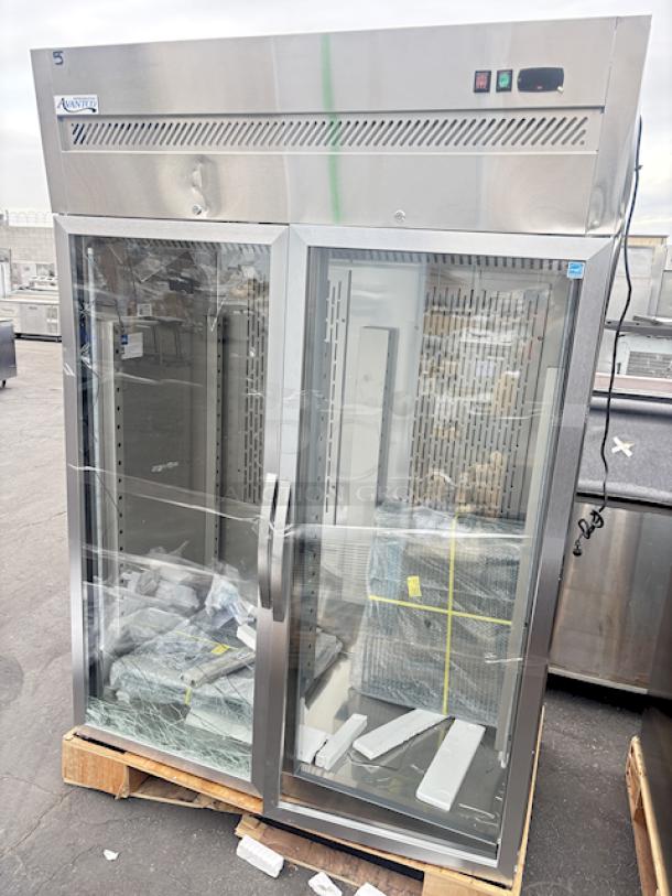 BRAND NEW SCRATCH & DENT! Avantco Z2-R-GHC 54" Glass Door Stainless Steel Reach-In Refrigerator. Glass is broken and the top is dented. 115v, 54 x 31-3/8 x 81-11/16 S/N: 211565611 6868 2409 - Image 1 of 6