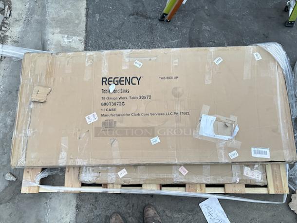 BRAND NEW SCRATCH & DENT! Regency 600T3072G 30" x 72" 18-Gauge 304 Stainless Steel Commercial Work Table with Galvanized Legs and Undershelf. Original Packaging Was Destroyed. - Image 1 of 1