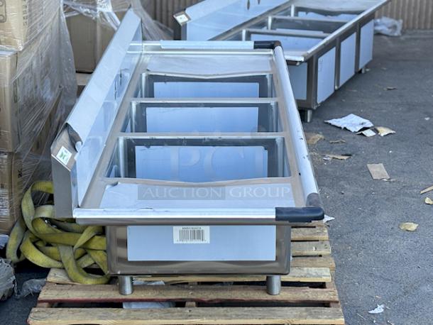 BRAND NEW SCRATCH AND DENT! Regency 60031824218 94" 16-Gauge Stainless Steel Three Compartment
Commercial Sink with 2 Drainboards - 18" x 24" x 14" Bowls With 9 3/4" Tall Backsplash . Sink Component Only. - Image 4 of 8
