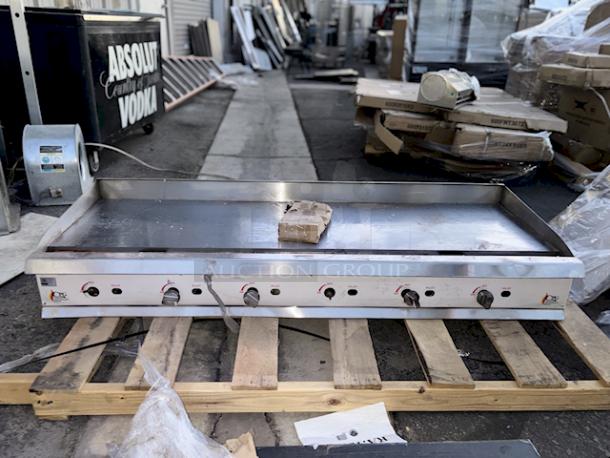 BRAND NEW SCRATCH & DENT! Cooking Performance Group GM-CPG-72-NL 72" Gas Countertop Griddle with Manual Controls - 180,000 BTU. S/N: 2311007664. 72 Inches	x 29 5/16 Inches x 16 3/4 Inches, 558 lb - Image 1 of 9