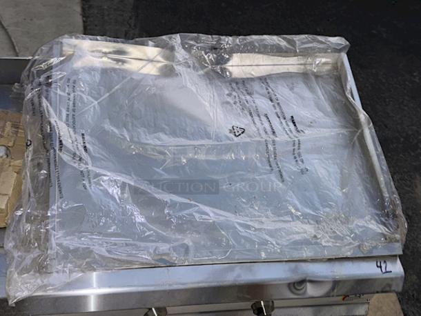 BRAND NEW SCRATCH & DENT! Cooking Performance Group GM-CPG-72-NL 72" Gas Countertop Griddle with Manual Controls - 180,000 BTU. S/N: 2311007664. 72 Inches	x 29 5/16 Inches x 16 3/4 Inches, 558 lb - Image 8 of 9