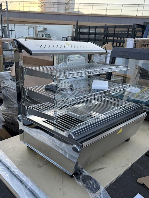 BRAND NEW SCRATCH & DENT! ServIt HDM-26 26" Self / Full Service 3 Shelf Countertop Heated Display Case with Sliding Doors - 120V, 1800W, 15 Amps	1 Phase	60 Hz	84 lb. S/N: 1556307300087. Glass is Broken On all sides. - Image 4 of 5