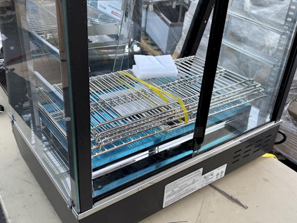 BRAND NEW SCRATCH & DENT! Avantco HDC-26 26" Self/Full Service 3 Shelf Countertop Heated Display Case with Sliding Doors - 120V, 1580W, S/N: CK-240270R- 256 N, 86Lb. Minor denting in upper corners. (see photos). - Image 7 of 9
