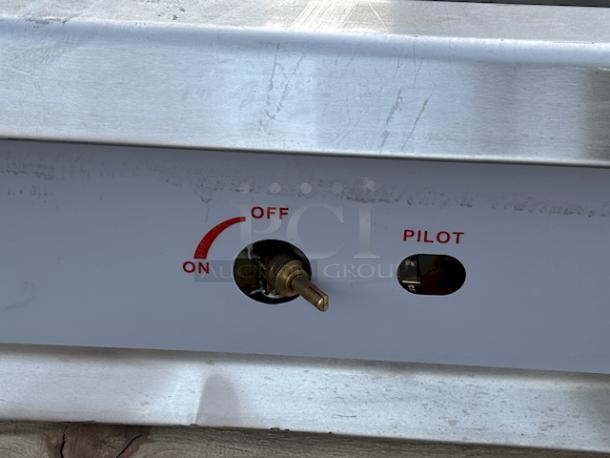 BRAND NEW SCRATCH & DENT! Cooking Performance Group GM-CPG-72-NL 72" Gas Countertop Griddle with Manual Controls - 180,000 BTU. 72"x29-5/16"x16-3/4", 558Lb. Unit is dented, missing knob and grease trays. See photos. - Image 6 of 8