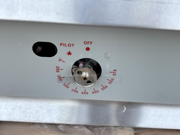 BRAND NEW SCRATCH & DENT! Cooking Performance Group GT-CPG-48-NL 48" Gas Countertop Griddle with Flame Failure Protection and Thermostatic Controls - 120,000 BTU. S/N: 2302000397. Knob is broken, Unit is dented. - Image 3 of 6