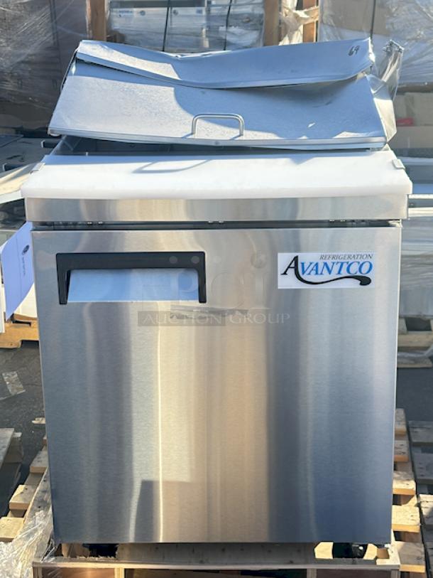 BRAND NEW SCRATCH & DENT! Avantco APT-27-HC 27" 1 Door Refrigerated Sandwich Prep Table, 115 Volts	3.6 Amps	1 Phase	60 Hz	219 lb. S/N: 253717537. In Working Order. On Commercial Casters. Lid is dented and bent. - Image 1 of 7