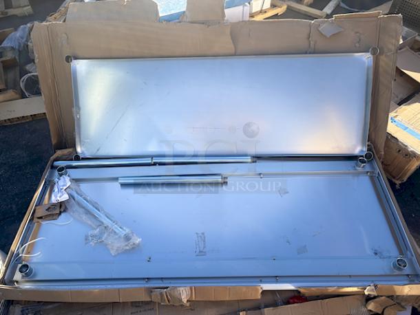 BRAND NEW! "Steelton 30" x 72" 18-Gauge Stainless Steel Equipment Stand with Undershelf and Galvanized Legs. In original packaging, unit has some easily fixable denting/bending (see photos). - Image 4 of 7
