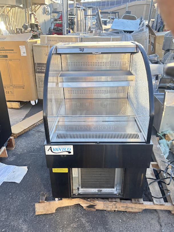 BRAND NEW SCRATCH & DENT! Avantco BHAC-28 28" Black Horizontal Air Curtain Merchandiser - 115V/7.8 Amps/1 Phase	/362 lb. S/N: 2821852213872038. TESTED! In Working Order. Glass on left side is damaged, missing vent. See Photos. - Image 1 of 8