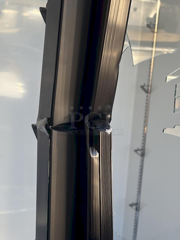 BRAND NEW SCRATCH & DENT! Avantco GDC-49-HC 53" Black Swing Glass Door Merchandiser Refrigerator with LED Lighting. Tested. In Working Order. 115 Volts/6 Amps/1 Phase/480 lb. S/N: 028081364. 53-1/8"x31-7/8"x83-7/8". Outer pane of glass is broken on the left side, both panes are broken on the right side,  doors and sides have dents. (see photos). - Image 5 of 10