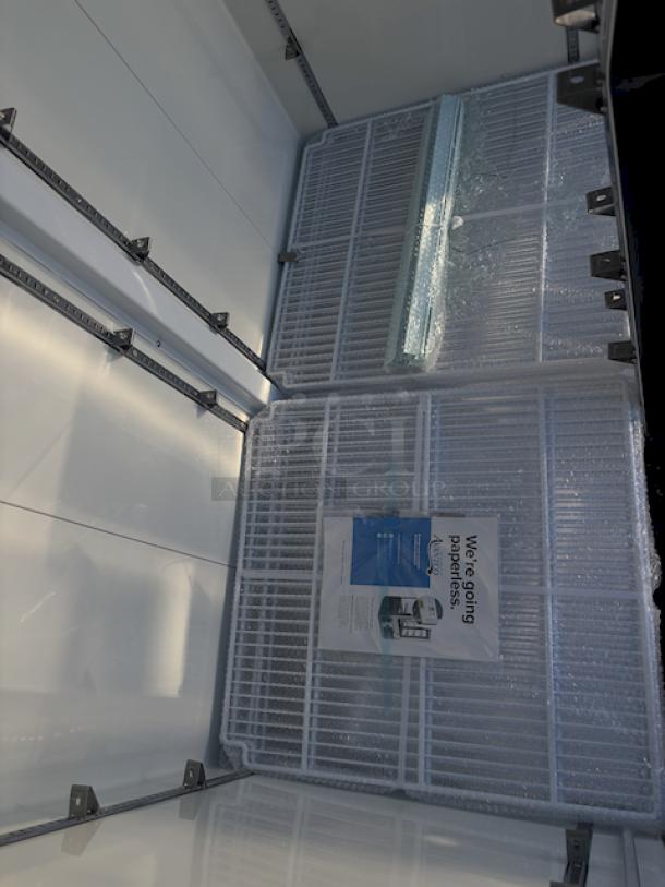 BRAND NEW SCRATCH & DENT! Avantco GDC-49-HC 53" Black Swing Glass Door Merchandiser Refrigerator with LED Lighting. Tested. In Working Order. 115 Volts/6 Amps/1 Phase/480 lb. S/N: 028081364. 53-1/8"x31-7/8"x83-7/8". Outer pane of glass is broken on the left side, both panes are broken on the right side,  doors and sides have dents. (see photos). - Image 6 of 10