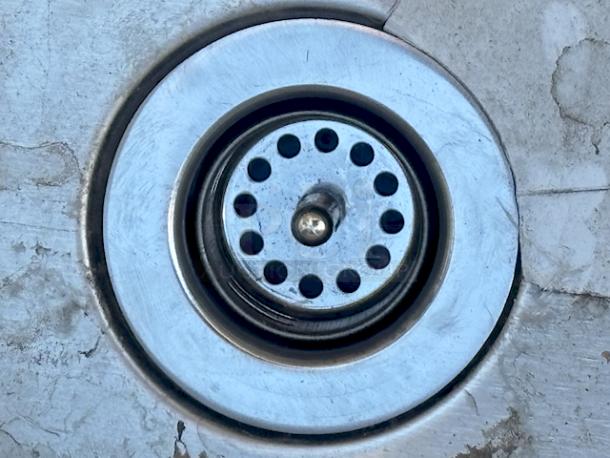 BRAND NEW OUT OF ORIGINAL PACKAGING! Regency 600UHS2112 1 Bowl Underbar Hand Sink - 21" x 12" x 33". 31.82 Lb. Includes drain and legs w/ adjustable bullet feet. Superficial denting, left back leg has a inward slight bend. (see photos). - Image 7 of 9