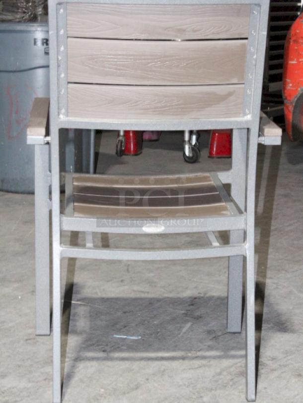 LIGHTLY USED! Upscale Mingja MJ-686 Outdoor Table With a sleek aluminum frame and a durable PVC wicker top & 4 Matching MJ-589  Silver Frame Aluminum Arm Chair with PVC Wicker Outdoor Chairs. 5x Your Bid Table Dimensions: 52x29x30. Chair Dimensions: 22x22x32 (seat Height: 18").


*These items are located at our main warehouse approximately 10mins away. The address is 3290 S. Highland Dr. Las Vegas NV 89109.* - Image 7 of 11