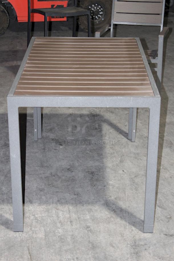 LIGHTLY USED! Upscale Mingja MJ-686 Outdoor Table With a sleek aluminum frame and a durable PVC wicker top & 4 Matching MJ-589  Silver Frame Aluminum Arm Chair with PVC Wicker Outdoor Chairs. 5x Your Bid Table Dimensions: 52x29x30. Chair Dimensions: 22x22x32 (seat Height: 18").


*These items are located at our main warehouse approximately 10mins away. The address is 3290 S. Highland Dr. Las Vegas NV 89109.* - Image 9 of 11