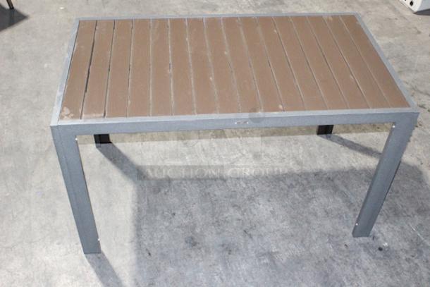 LIGHTLY USED! Upscale Mingja MJ-686 Outdoor Table With a sleek aluminum frame and a durable PVC wicker top & 4 Matching MJ-589  Silver Frame Aluminum Arm Chair with PVC Wicker Outdoor Chairs. 5x Your Bid Table Dimensions: 52x29x30. Chair Dimensions: 22x22x32 (seat Height: 18").


*These items are located at our main warehouse approximately 10mins away. The address is 3290 S. Highland Dr. Las Vegas NV 89109.* - Image 1 of 10