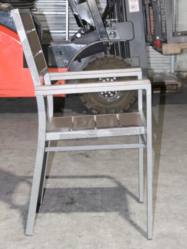 LIGHTLY USED! Upscale Mingja MJ-686 Outdoor Table With a sleek aluminum frame and a durable PVC wicker top & 4 Matching MJ-589  Silver Frame Aluminum Arm Chair with PVC Wicker Outdoor Chairs. 5x Your Bid Table Dimensions: 52x29x30. Chair Dimensions: 22x22x32 (seat Height: 18").


*These items are located at our main warehouse approximately 10mins away. The address is 3290 S. Highland Dr. Las Vegas NV 89109.* - Image 5 of 10