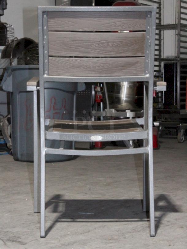 LIGHTLY USED! Upscale Mingja MJ-686 Outdoor Table With a sleek aluminum frame and a durable PVC wicker top & 4 Matching MJ-589  Silver Frame Aluminum Arm Chair with PVC Wicker Outdoor Chairs. 5x Your Bid Table Dimensions: 52x29x30. Chair Dimensions: 22x22x32 (seat Height: 18").


*These items are located at our main warehouse approximately 10mins away. The address is 3290 S. Highland Dr. Las Vegas NV 89109.* - Image 6 of 10