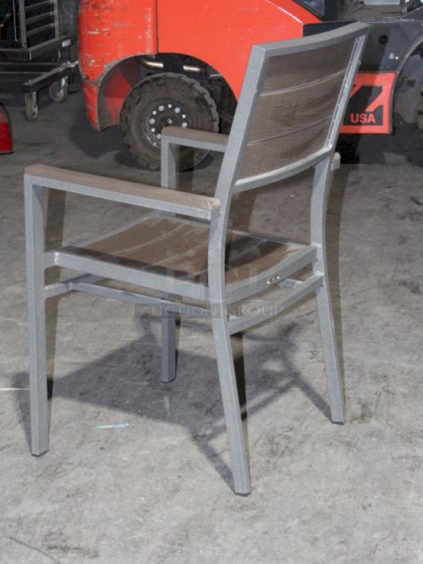 LIGHTLY USED! Upscale Mingja MJ-686 Outdoor Table With a sleek aluminum frame and a durable PVC wicker top & 4 Matching MJ-589  Silver Frame Aluminum Arm Chair with PVC Wicker Outdoor Chairs. 5x Your Bid Table Dimensions: 52x29x30. Chair Dimensions: 22x22x32 (seat Height: 18").


*These items are located at our main warehouse approximately 10mins away. The address is 3290 S. Highland Dr. Las Vegas NV 89109.* - Image 7 of 10