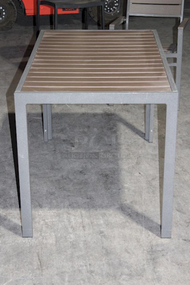 LIGHTLY USED! Upscale Mingja MJ-686 Outdoor Table With a sleek aluminum frame and a durable PVC wicker top & 3 Matching MJ-589  Silver Frame Aluminum Arm Chair with PVC Wicker Outdoor Chairs. 4x Your Bid Table Dimensions: 52x29x30. Chair Dimensions: 22x22x32 (seat Height: 18").


*These items are located at our main warehouse approximately 10mins away. The address is 3290 S. Highland Dr. Las Vegas NV 89109.* - Image 10 of 11