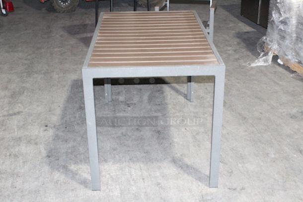 LIGHTLY USED! Upscale Mingja MJ-686 Outdoor Table With A Sleek Aluminum Frame And A Durable Pvc Wicker Top! 52x29-1/4x30. 


*These items are located at our main warehouse approximately 10mins away. The address is 3290 S. Highland Dr. Las Vegas NV 89109.* - Image 5 of 6