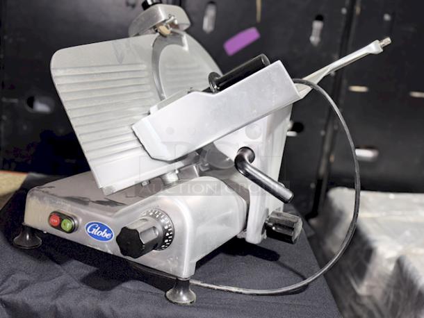 Globe G12 Medium Duty 12 In. Manual Slicer, Angled Feed, 1/2HP Motor. 115v/1Ph/3Amp/60Hz S/N: 529996. 


*These items are located at our main warehouse approximately 10mins away. The address is 3290 S. Highland Dr. Las Vegas NV 89109.* - Image 2 of 5