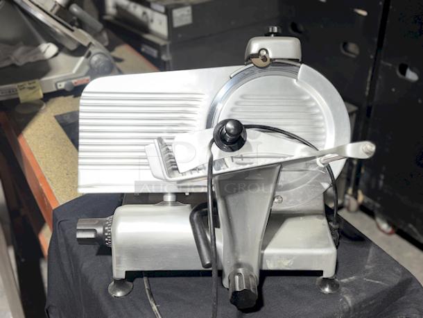 Hobart 2812 Smart Features Manual Commercial Deli Meat Slicer. 120V/60Hz1Ph/5Amp. 1/2Horse Power. Missing the rod for the meat grip (see photos). 


*These items are located at our main warehouse approximately 10mins away. The address is 3290 S. Highland Dr. Las Vegas NV 89109.* - Image 2 of 5