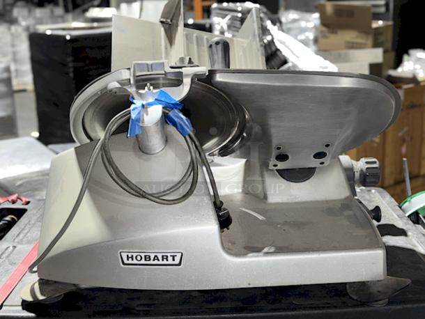 Hobart 2812 Smart Features Manual Commercial Deli Meat Slicer. 120V/60Hz1Ph/5Amp. 1/2Horse Power. Missing the rod for the meat grip (see photos). 


*These items are located at our main warehouse approximately 10mins away. The address is 3290 S. Highland Dr. Las Vegas NV 89109.* - Image 4 of 5