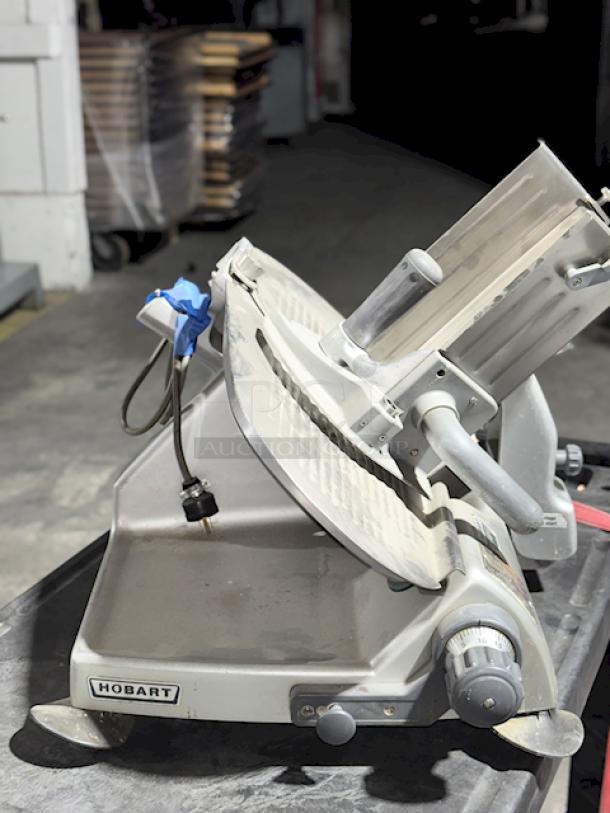 Hobart 2812 Smart Features Manual Commercial Deli Meat Slicer. 120V/60Hz1Ph/5Amp. 1/2Horse Power. Missing the rod for the meat grip (see photos). 


*These items are located at our main warehouse approximately 10mins away. The address is 3290 S. Highland Dr. Las Vegas NV 89109.* - Image 5 of 5