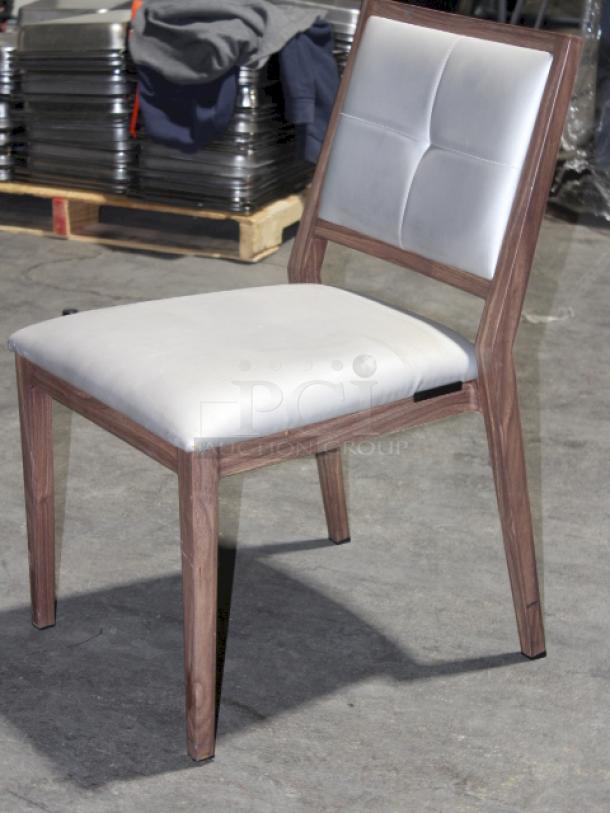 HIGH QUALITY! Modern Aliwood Armless Dining Chair. Fully welded Aluminum Frame w/ Wood Finish, Upholstered Vinyl Seat and Backrest, Padded High Density Commercial Grade Foam, Nylon Foot Glides, Color: Sterling. 4x Your Bid........


*These items are located at our main warehouse approximately 10mins away. The address is 3290 S. Highland Dr. Las Vegas NV 89109.* - Image 1 of 6