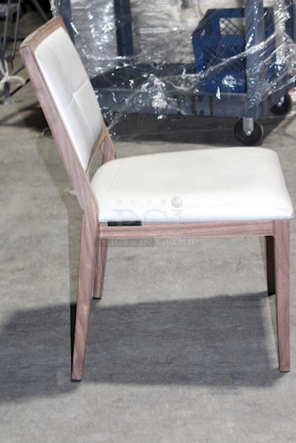 HIGH QUALITY! Modern Aliwood Armless Dining Chair. Fully welded Aluminum Frame w/ Wood Finish, Upholstered Vinyl Seat and Backrest, Padded High Density Commercial Grade Foam, Nylon Foot Glides, Color: Sterling. 4x Your Bid........


*These items are located at our main warehouse approximately 10mins away. The address is 3290 S. Highland Dr. Las Vegas NV 89109.* - Image 3 of 6