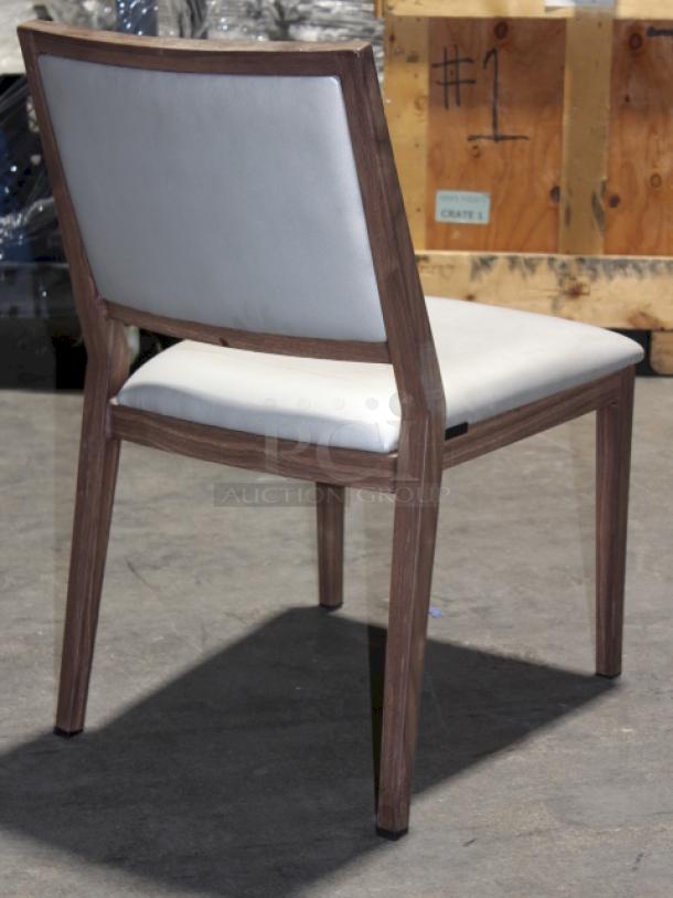 HIGH QUALITY! Modern Aliwood Armless Dining Chair. Fully welded Aluminum Frame w/ Wood Finish, Upholstered Vinyl Seat and Backrest, Padded High Density Commercial Grade Foam, Nylon Foot Glides, Color: Sterling. 4x Your Bid........


*These items are located at our main warehouse approximately 10mins away. The address is 3290 S. Highland Dr. Las Vegas NV 89109.* - Image 5 of 6