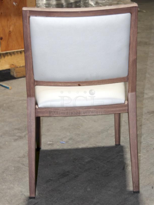 HIGH QUALITY! Modern Aliwood Armless Dining Chair. Fully welded Aluminum Frame w/ Wood Finish, Upholstered Vinyl Seat and Backrest, Padded High Density Commercial Grade Foam, Nylon Foot Glides, Color: Sterling. 4x Your Bid........


*These items are located at our main warehouse approximately 10mins away. The address is 3290 S. Highland Dr. Las Vegas NV 89109.* - Image 6 of 6